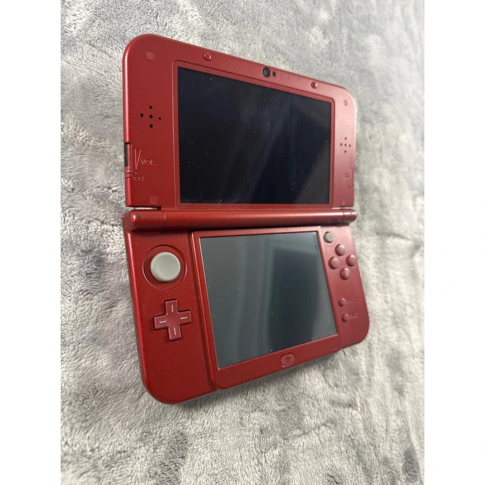 Nintendo New 3DS XL Metallic Red. Stylus and charger NOT included